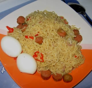 noodles with sausages vegetables and boiled eggs