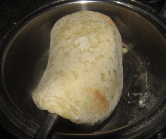 Flipping the hot dough