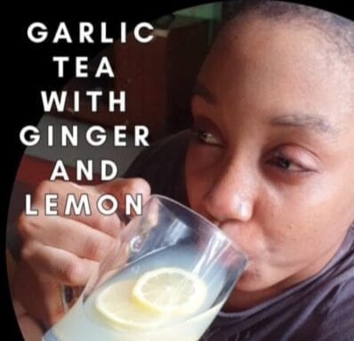 Drinking garlic ginger tea with lemon 